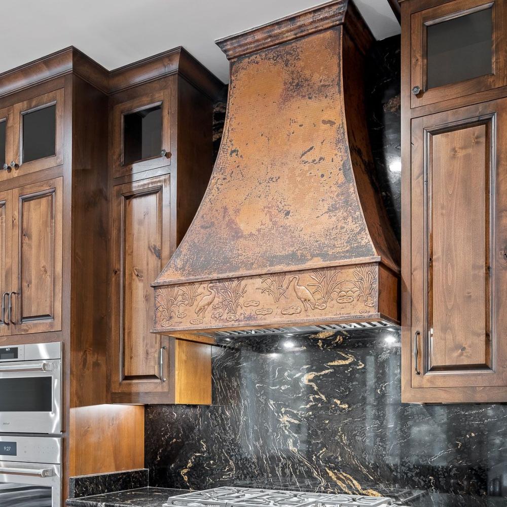 Don't forget the accents like range hoods when pairing sinks and countertops for kitchens.