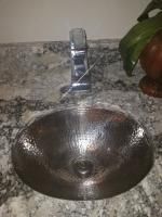 What is a corner bathroom sink?