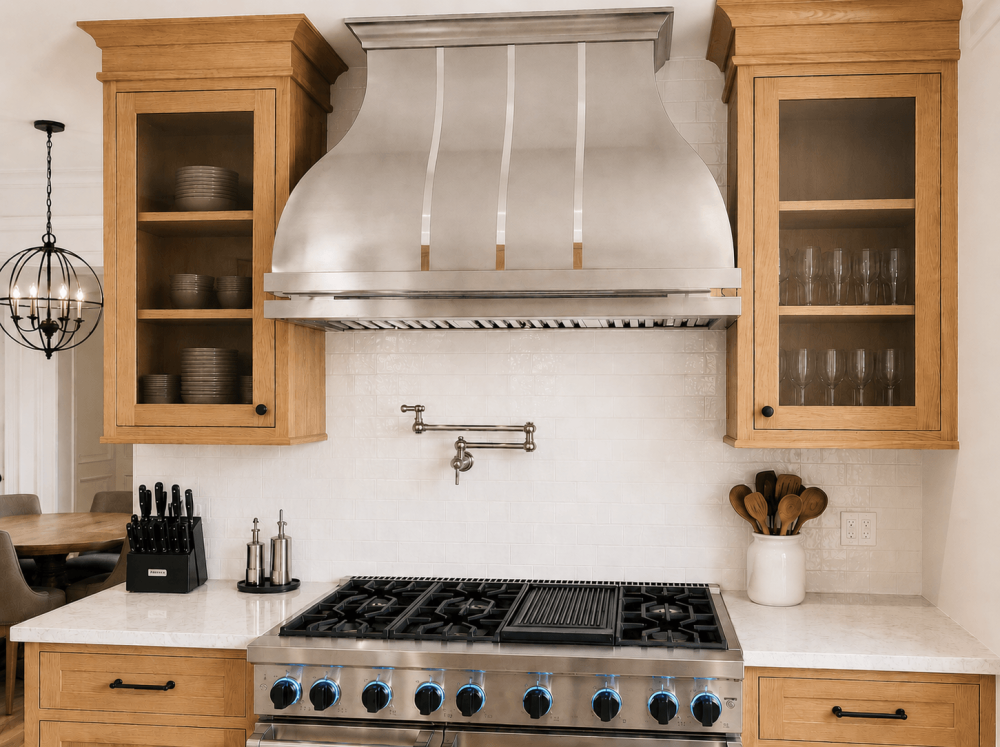 Modern farmhouse kitchen with custom stainless steel range hood in Camarillo, California close-up
