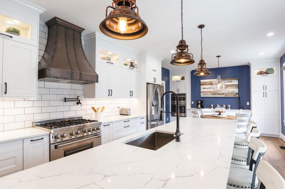 beautiful modern copper hood on white kitchen convertible range hood