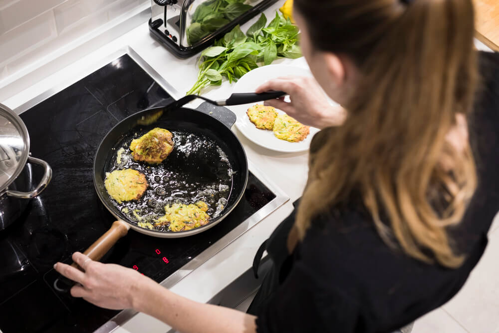 Range hoods can help to deal with the heat that is naturally generated by cooking.