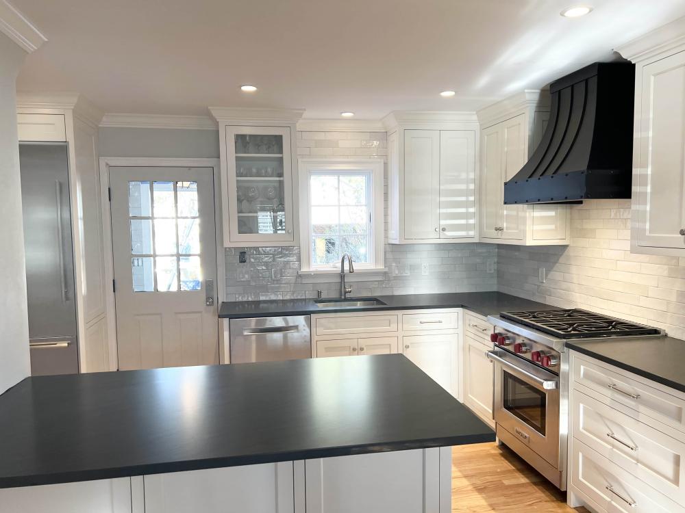 black countertops with white cabinets