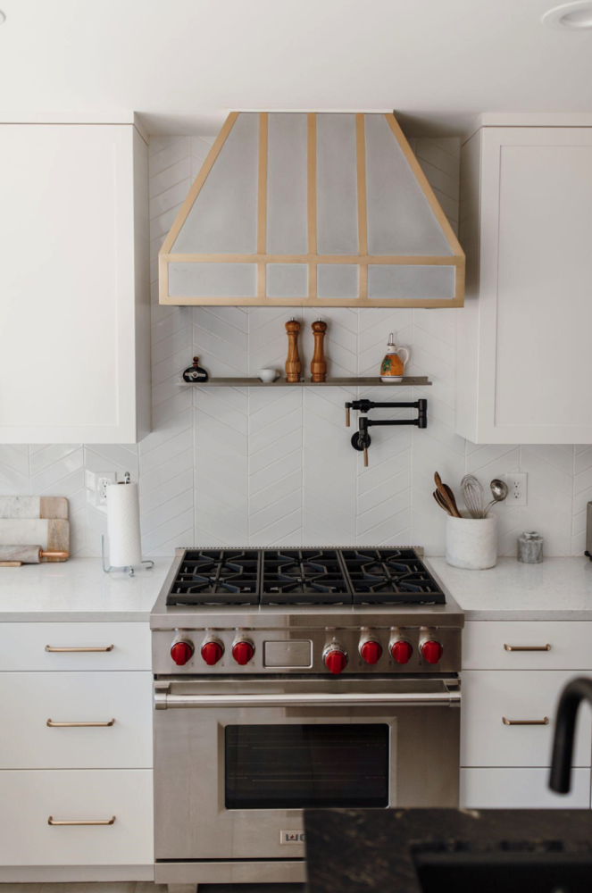 Skipping hardware on some cabinets can save space in a small kitchen. 
