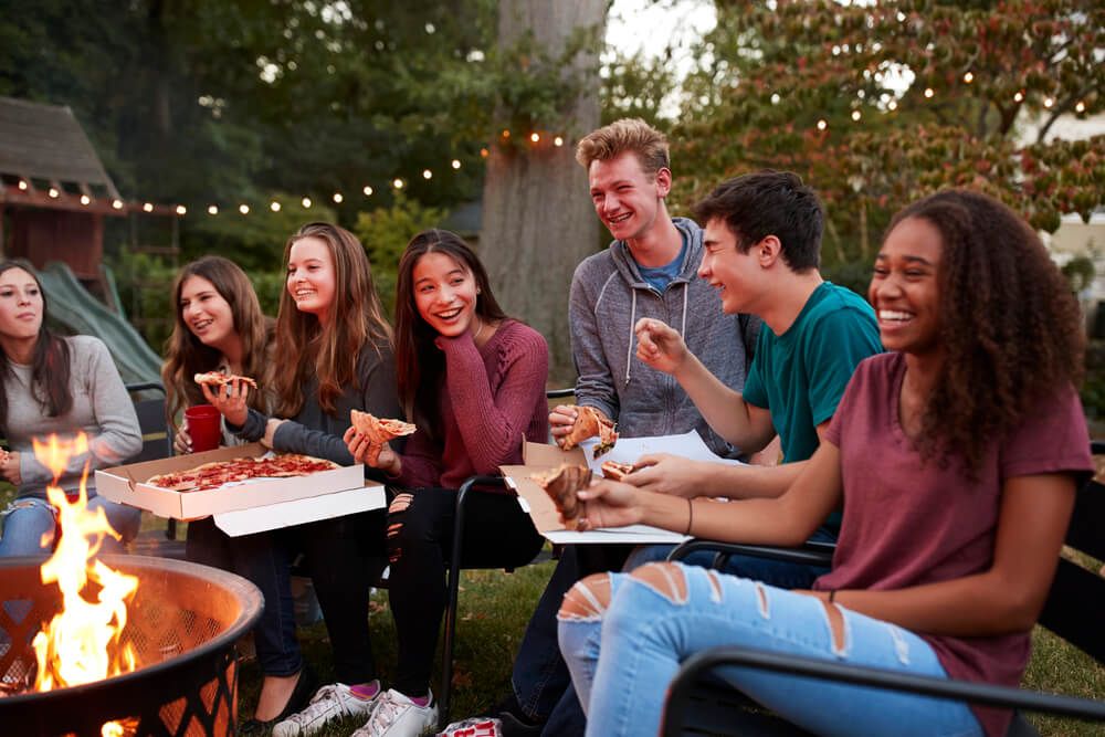 Friends love to gather around a smokeless firepit. 