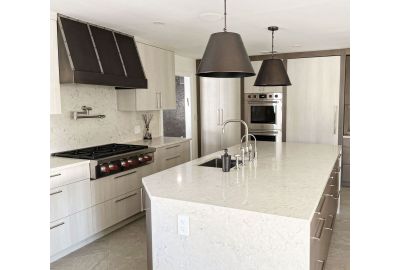 This Oakhurst Kitchen Nails Bold Contrast with a Custom Range Hood