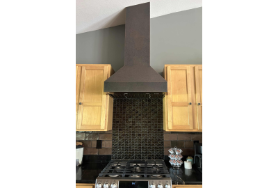 Choosing A Range Hood For A Sloped Ceiling