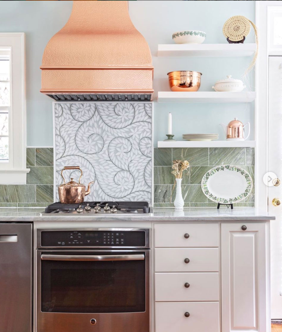 Bright copper range hood in a light filled kitchen World CopperSmith