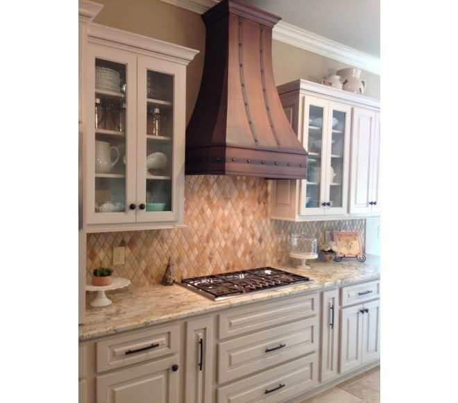 Stunning kitchen design with range hood, white kitchen cabinets,marble kitchen countertops marble backsplash