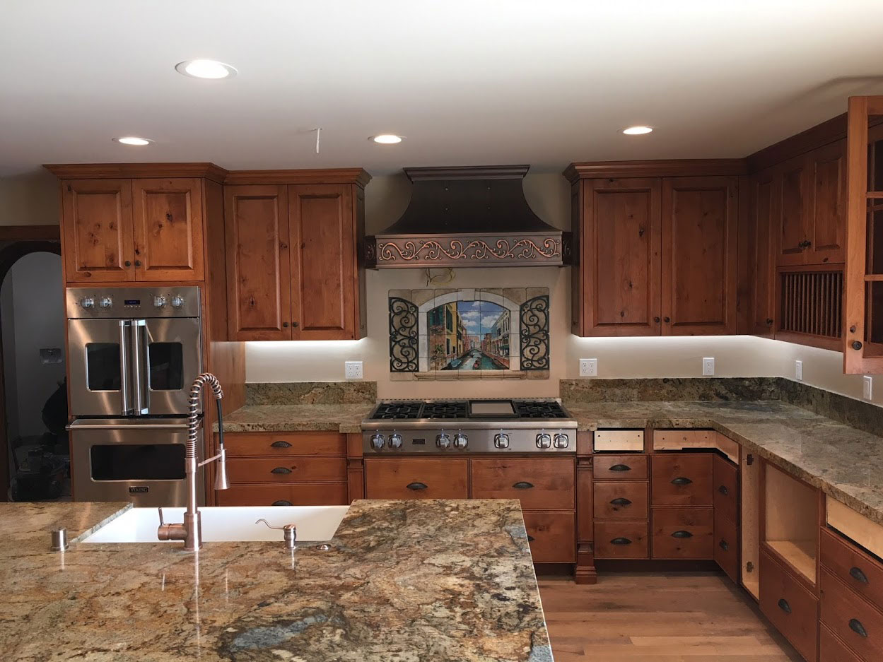 Small copper range hood in Tuscan kitchen World CopperSmith