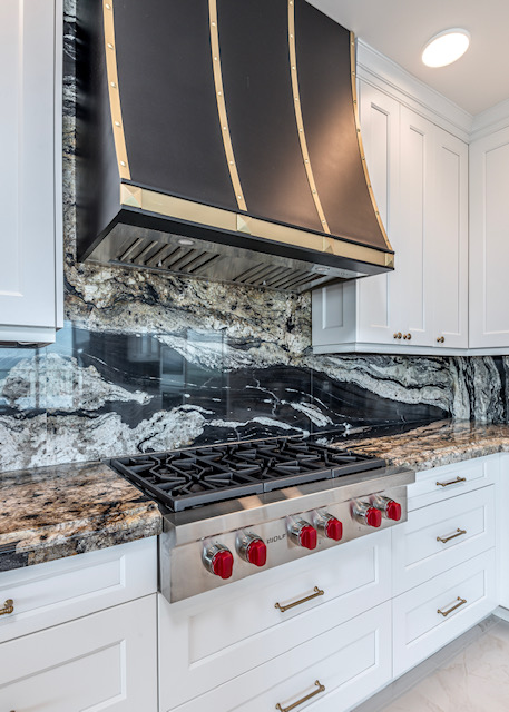 French kitchen design captivating range hood with elegant white kitchen cabinets, white kitchen countertops, stunning marble backsplash